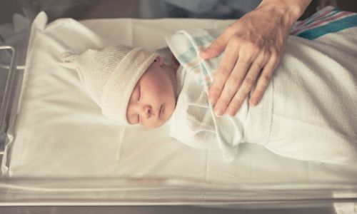 These are the five big firsts after having a baby cot